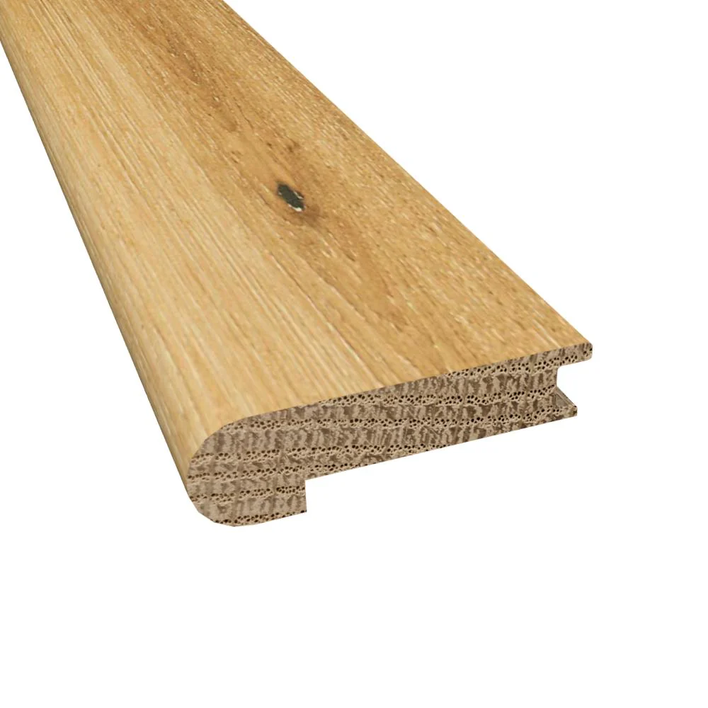 2551-prefinished-whispering-wheat-oak-9-16-in-thick-x-2-75-in-wide-x-6-5-ft-length-stair-nose-1.webp Prefinished Whispering Wheat Oak 9/16 in. Thick x 2.75 in. Wide x 6.5 ft. Length Stair Nose